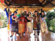 Corporate team wearing traditional Thai clothing during an experiential cultural team building program in Thailand.