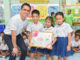 School students engaging in environmental CSR activities supported by corporate team building program in Thailand.