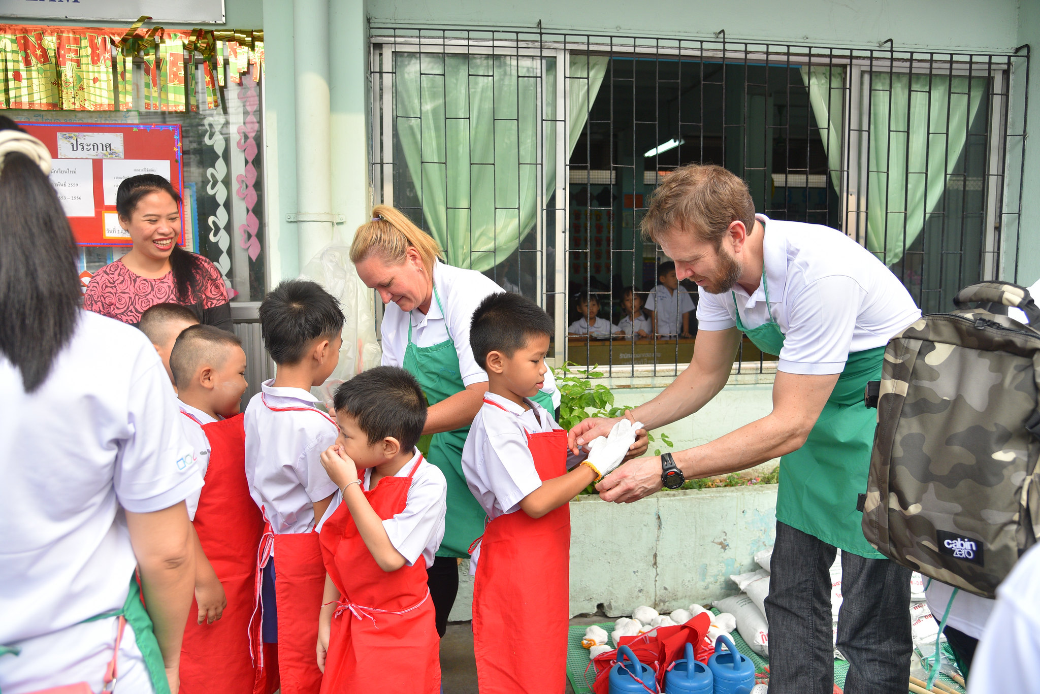 Community Development Projects Corporate volunteers supporting local school children through community development CSR project in Thailand.