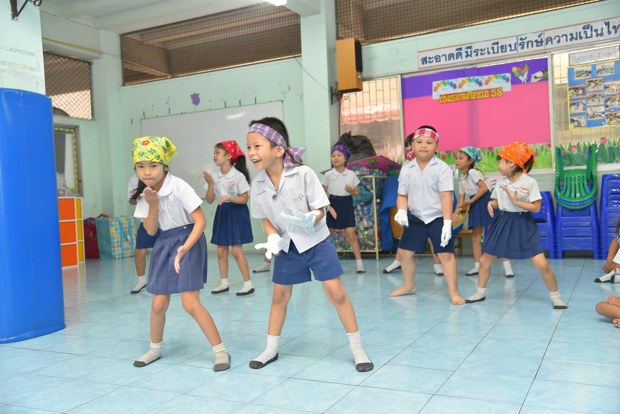 Environmental CSR Activities School children participating in educational support initiative as part of corporate CSR program in Thailand.