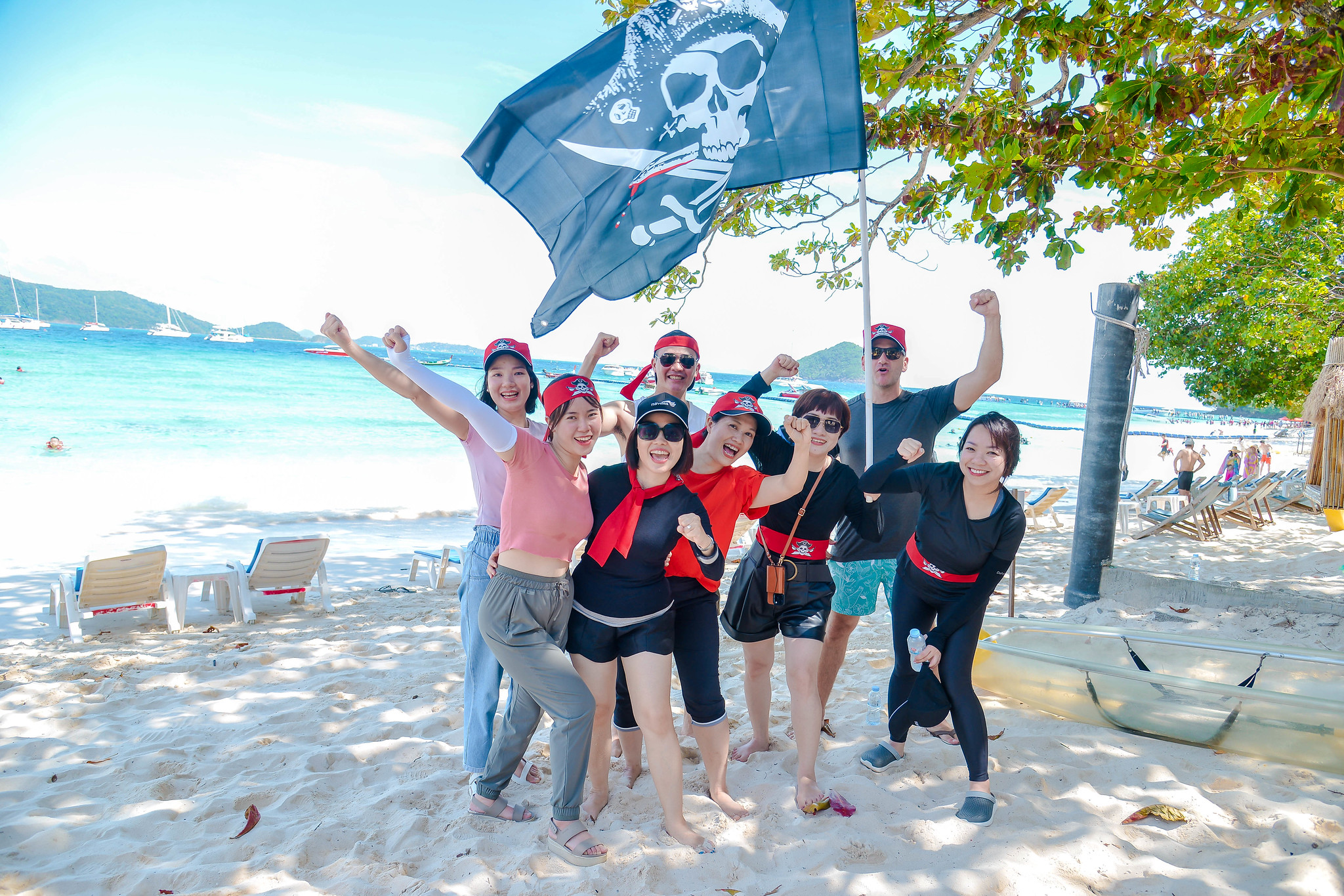 Pirate-themed treasure hunt team building activity on Phuket beach designed for corporate groups.