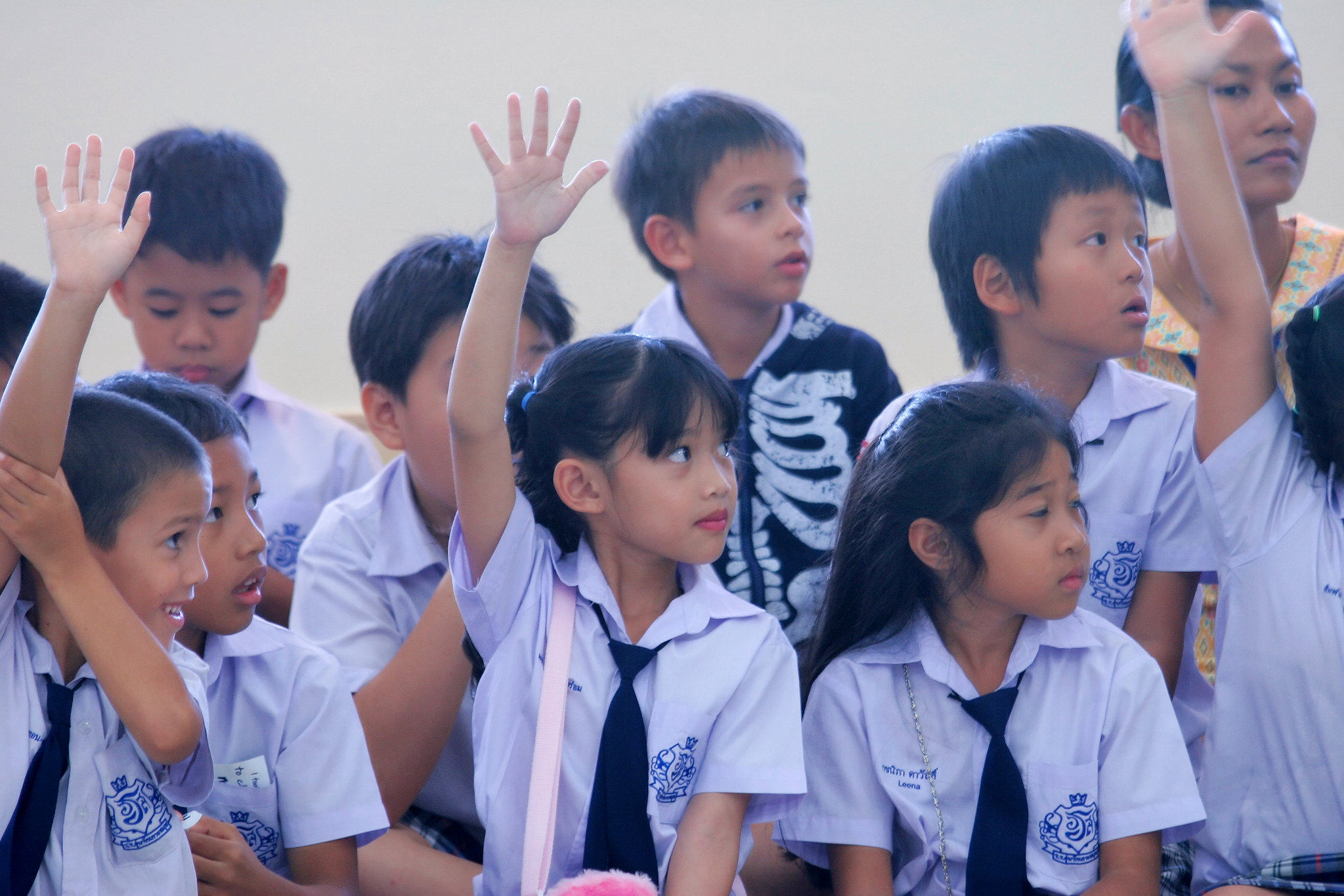 School Support & Educational Initiatives School children participating in educational support initiative as part of corporate CSR program in Thailand.