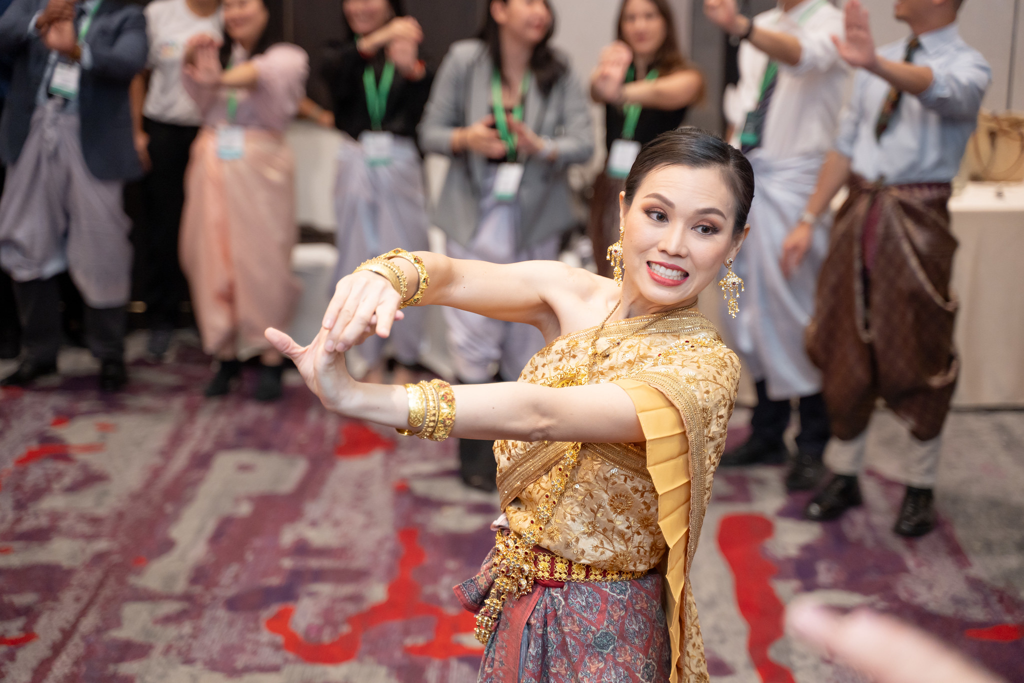 Thai Dance as a Shared Team Experience Thai traditional dance activity during corporate team building event in Bangkok