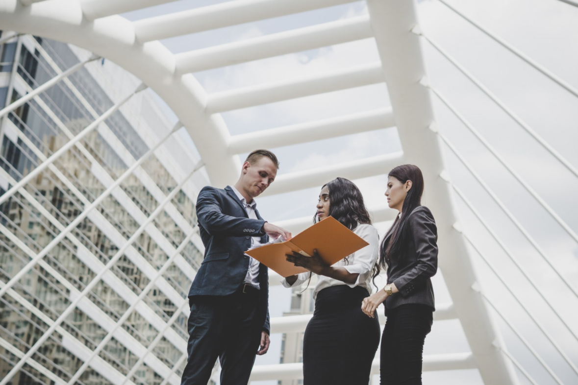 Business professionals planning cultural experiences with a destination management company in Kuala Lumpur