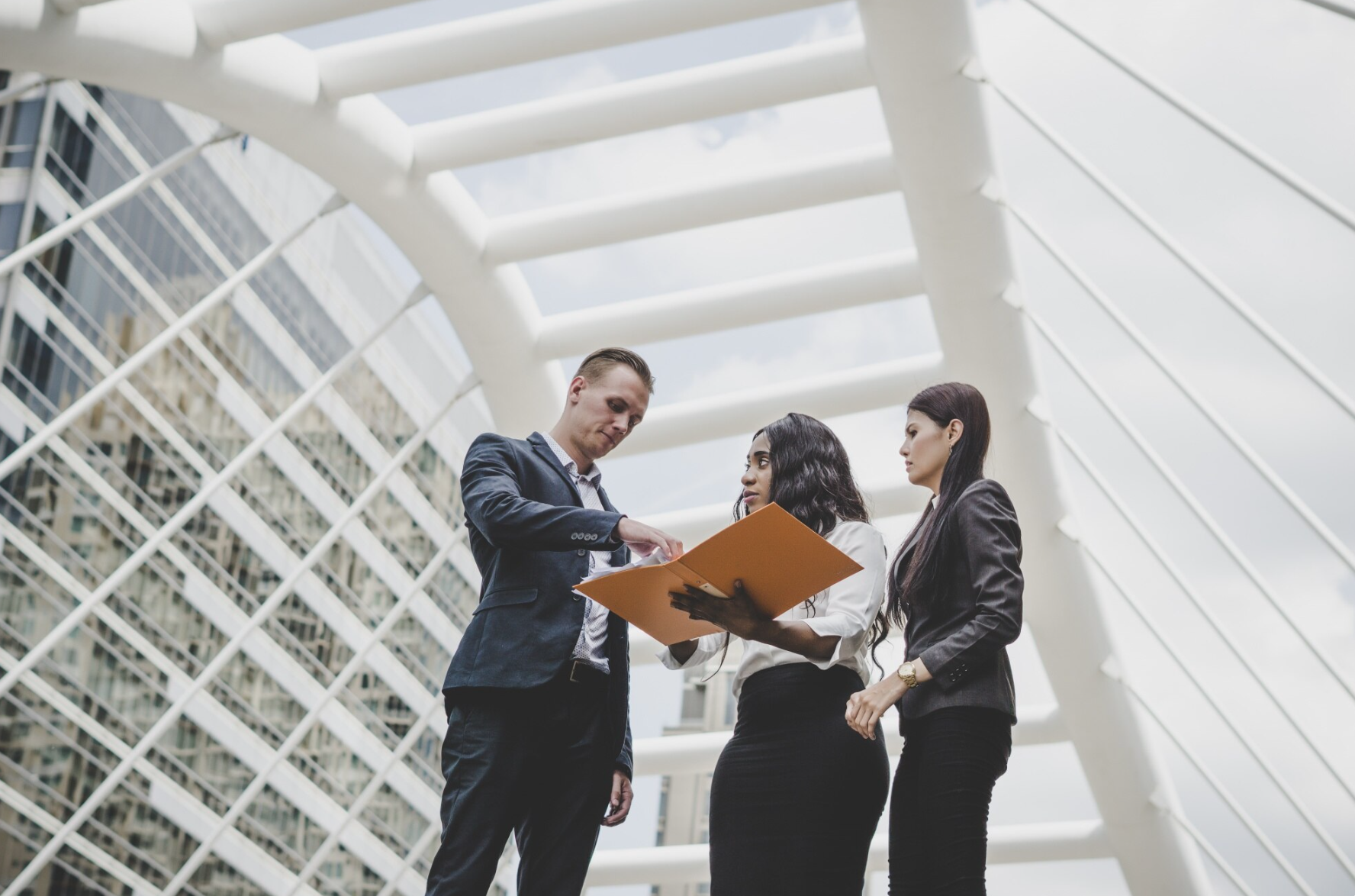 Professional Cultural Experiences with a Destination Management Organization in Kuala Lumpur Business professionals planning cultural experiences with a destination management company in Kuala Lumpur