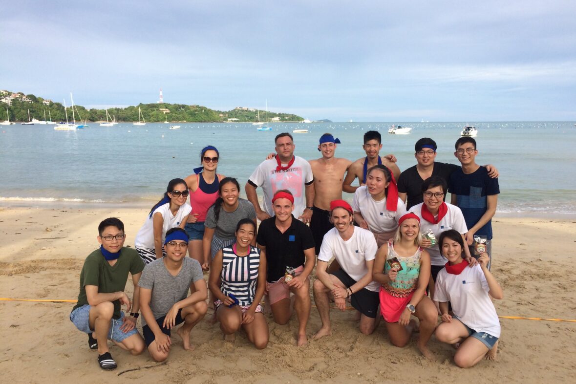 Beach Trust Challenge Team Building in Phuket for Corporate Groups Corporate group after completing a beach trust team building program in Phuket focused on collaboration and trust