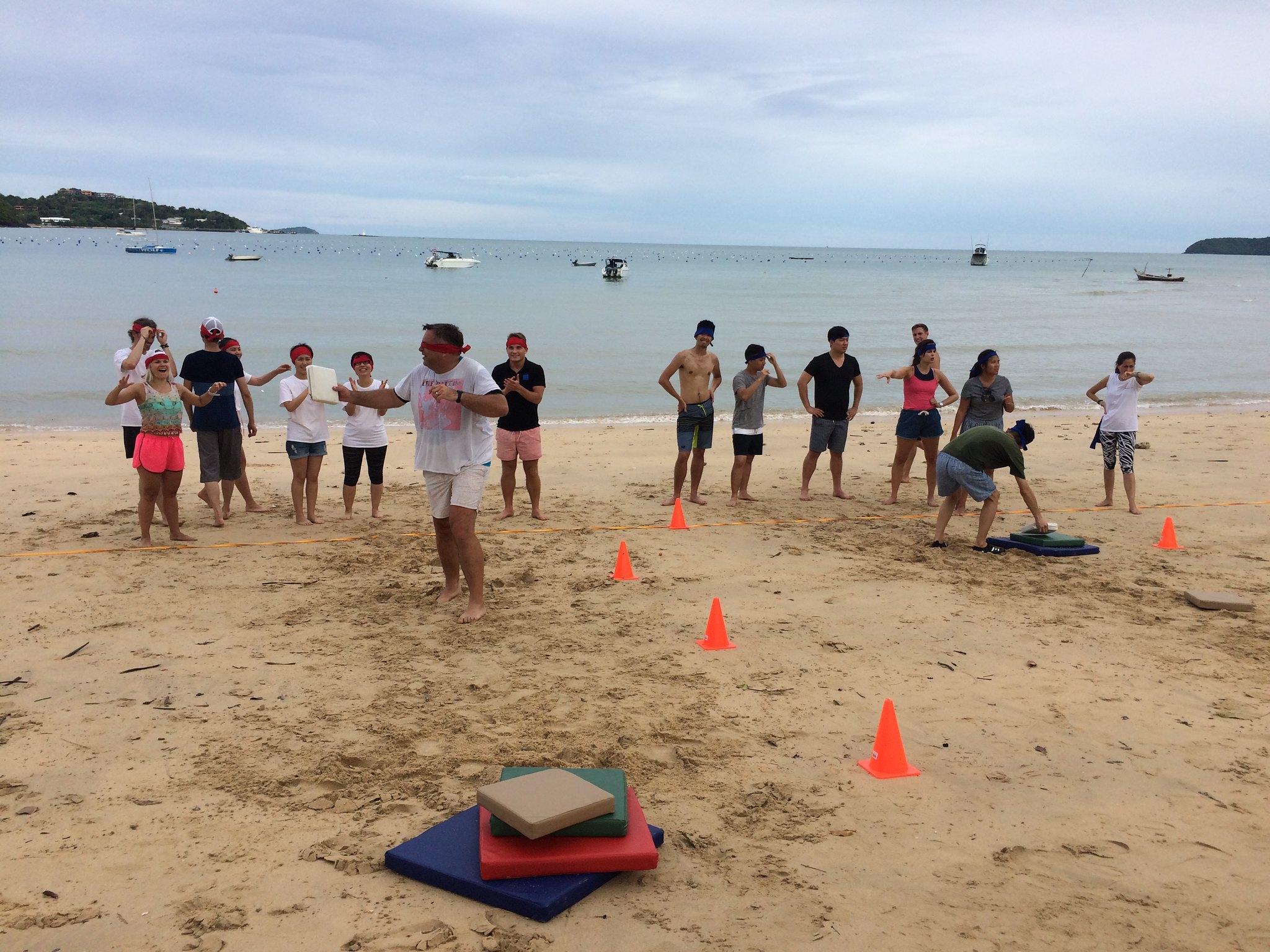 Communication, Coordination, and Team Alignment Beach team building exercise improving communication, coordination, and team alignment through collaborative challenges