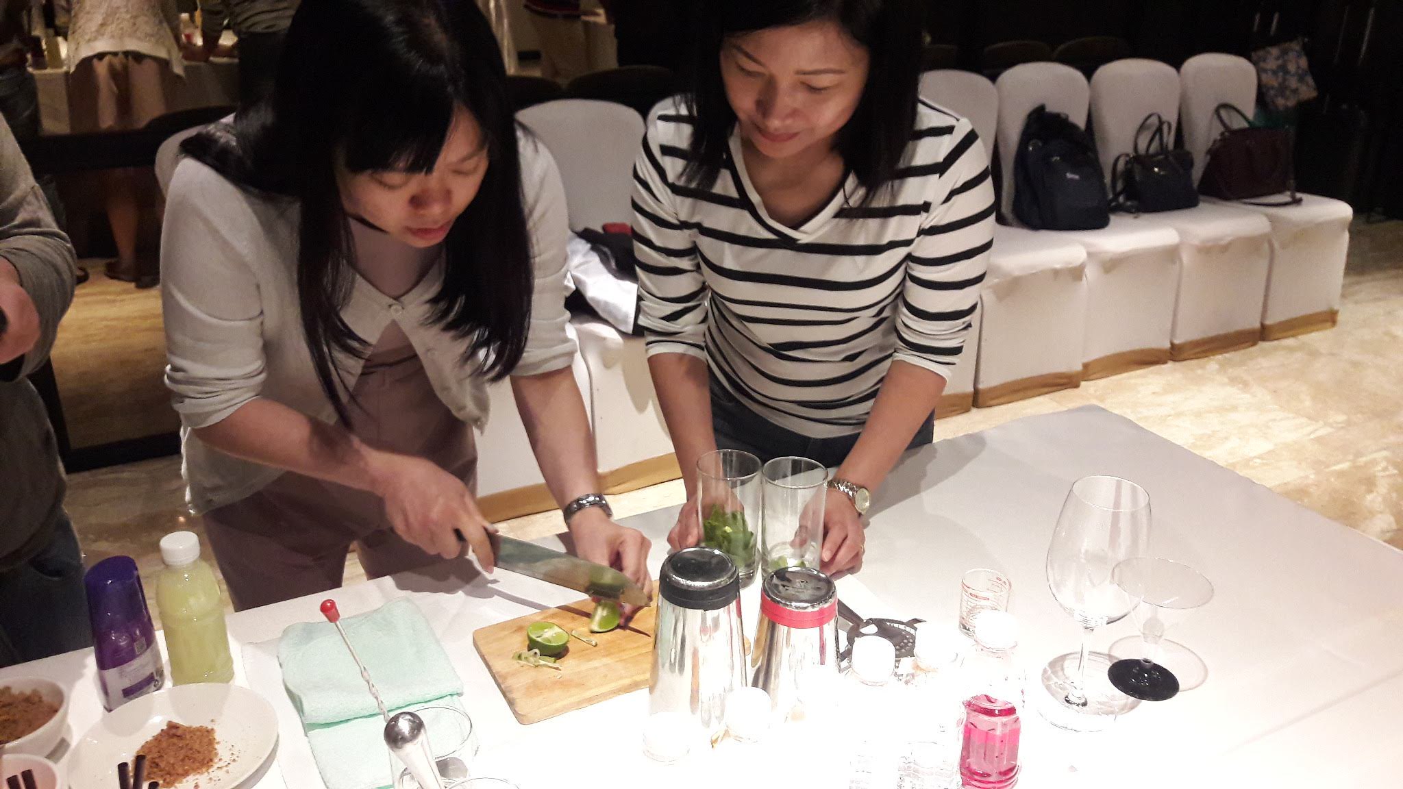 Creativity, Flavor Design, and Shared Ideas Corporate participants designing cocktail flavors together while sharing creative ideas and teamwork skills