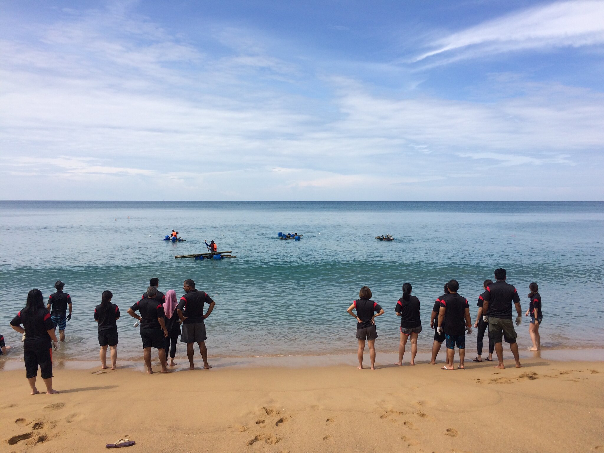 Raft Building Team Challenge in Phuket for Practical Collaboration Teams launching handmade rafts during a collaborative raft-building team-building challenge on a Phuket beach