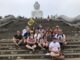 Corporate group exploring a Phuket landmark during a cultural discovery team building experience