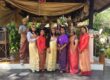 Corporate team experiencing Thai heritage in Phuket through traditional dress, cultural activities, and interactive team building